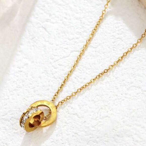 Roman numeral-engraved circles complemented by sparkling cubic zirconia - Picture 5 of 5